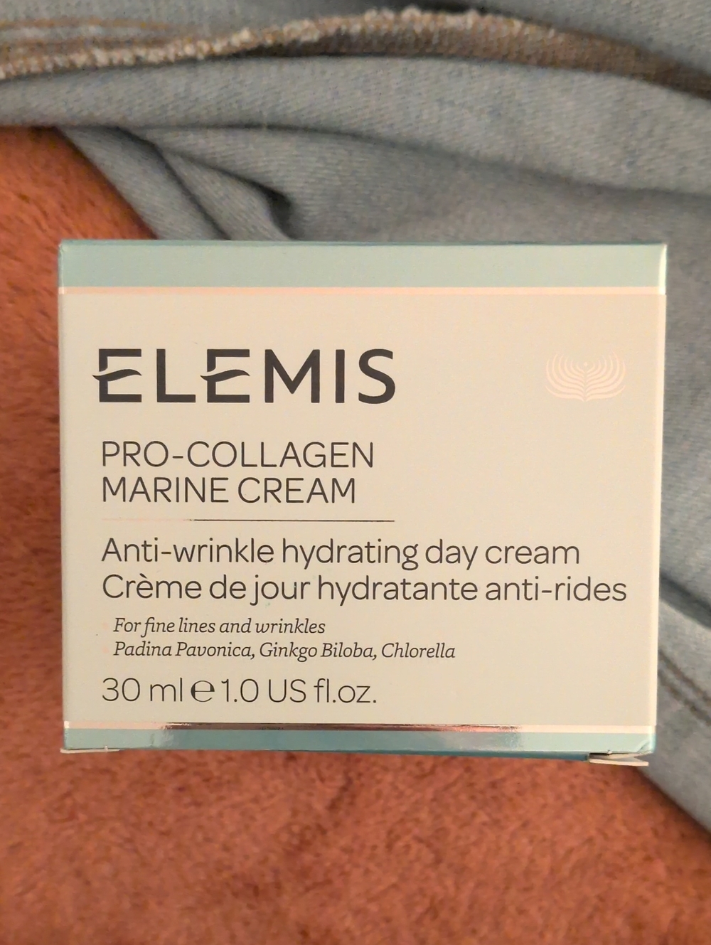 ELEMIS Pro-Collagen Marine Cream in white and aqua packaging